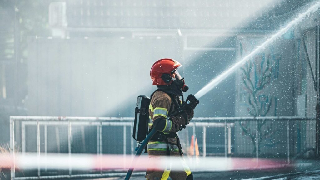 Student in safety uniform attending Diploma in Fire and Safety practical training at AMET Global Thiruvalla